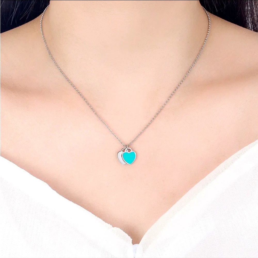 ON SALE! 925 Sterling Silver Necklace with two little hearts!